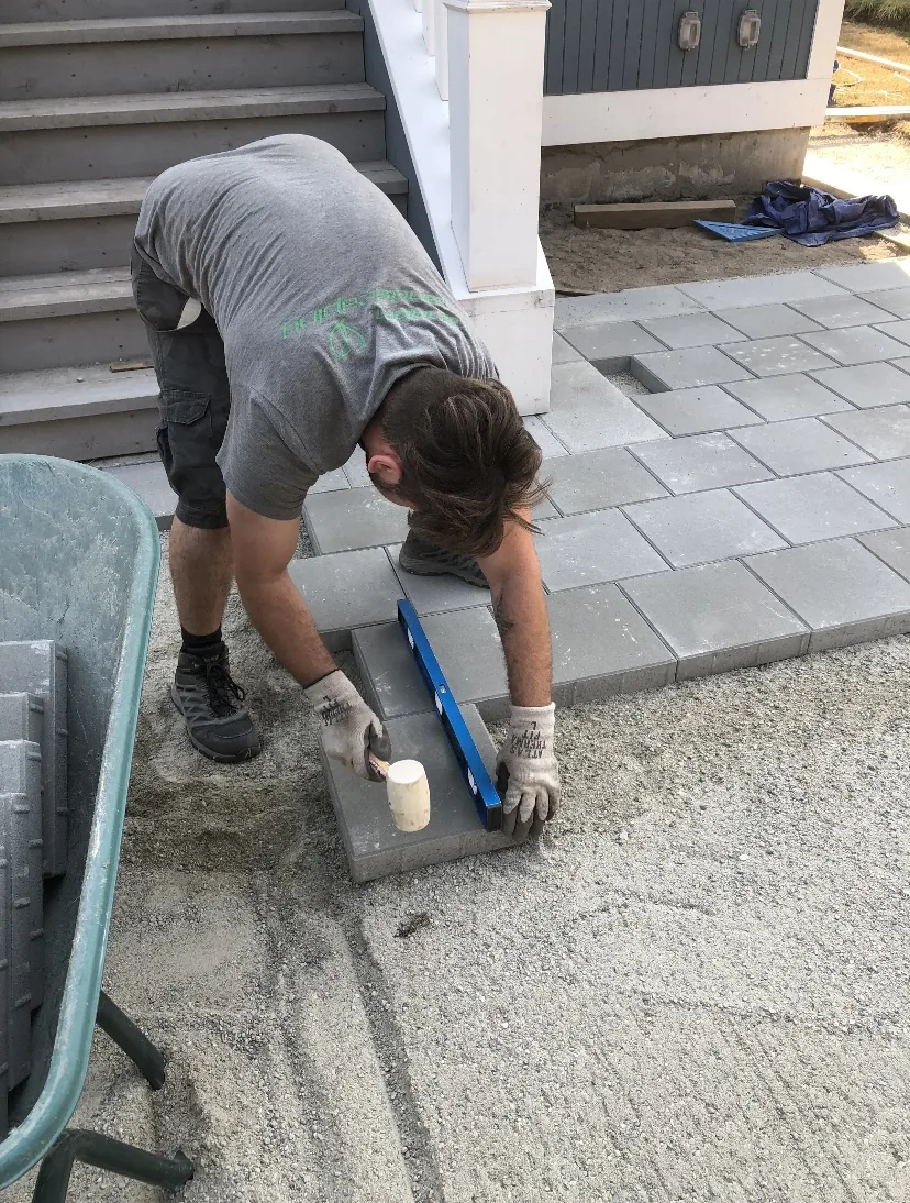 Repaired hardscape pathway. pavers, slabs and installed bricks